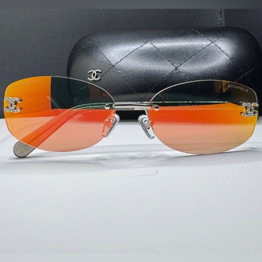 CHANEL Rimless Sunglasses with Orange Gradient Lenses and Silver Hardware